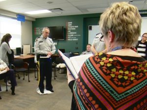 RCMP members from Alberta take part in the Kairos Blanket Exercise in Cochrane. (Laurent Pirot/CBC)