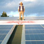 Chief Standing on Solar roof by Andrew Moore 2cropped