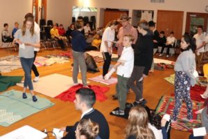 Island Pacific School students participate in the KAIROS Blanket Exercise. Photo by ISLAND PACIFIC SCHOOL
