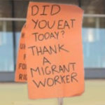 thank a migrant worker sign