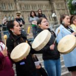 Indigenous Women drumming at Kitchi Blanket Exercise