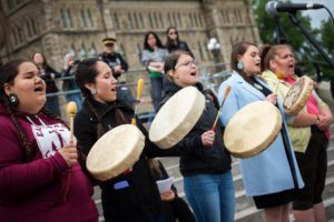 Indigenous Women drumming at Kitchi Blanket Exercise