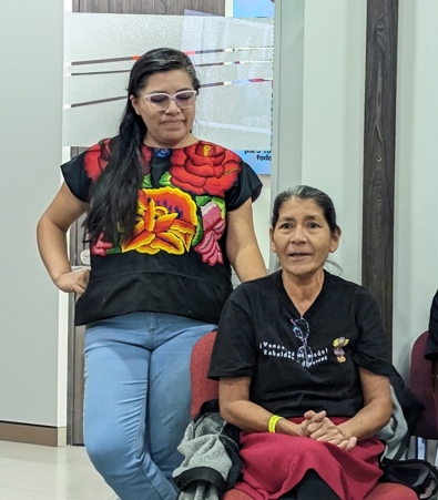 From left to right, Carmen Aliaga, La RED’s Coordinator and Vidalina Morales of ADES, based in El Salvador, during the first day of La RED’s 20th anniversary gathering in Bogota, Colombia.